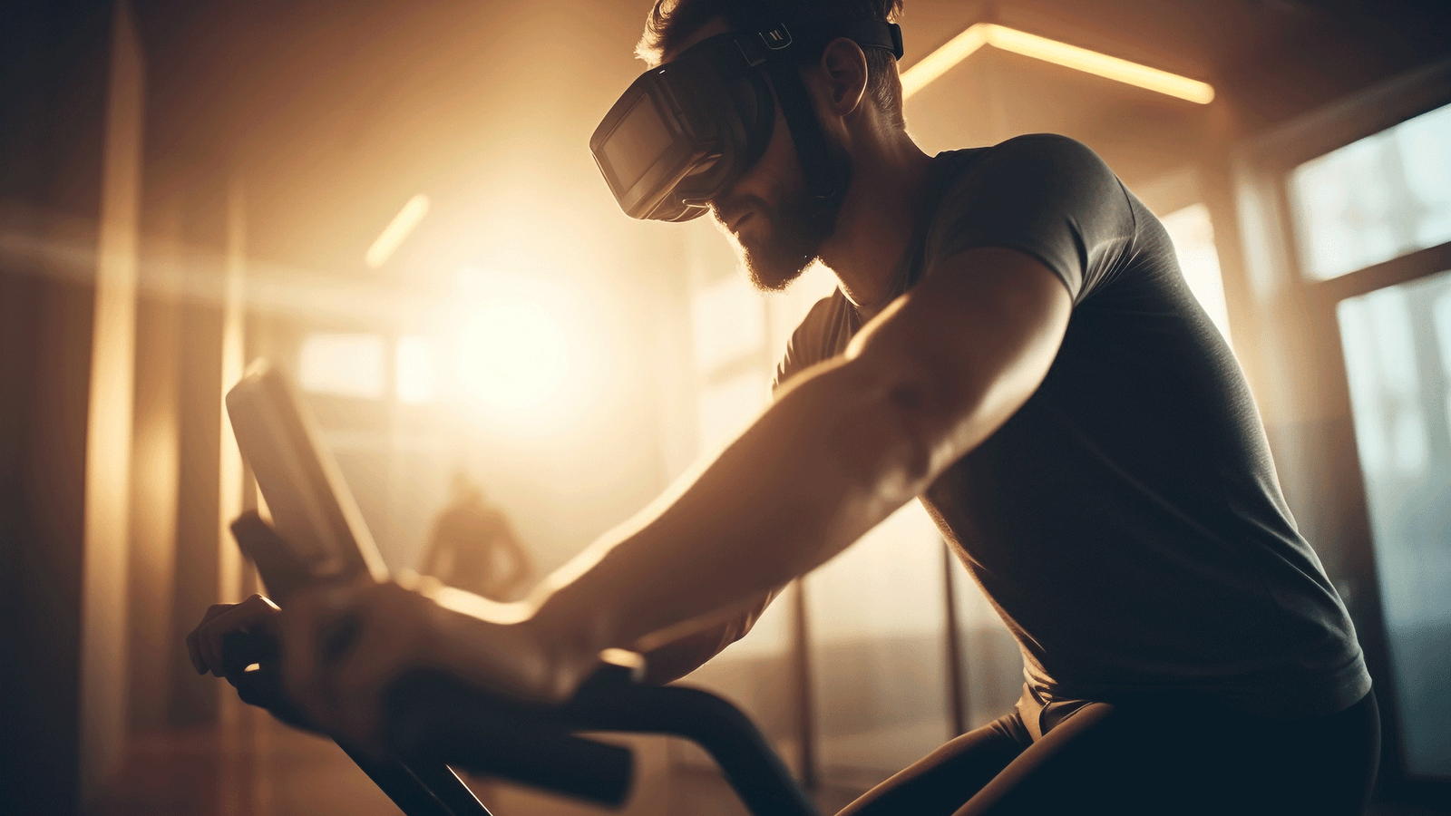 Hombre con gafas de realidad virtual sobre bicicleta estática en Fernando Arco Centro de Fisioterapia en Almería